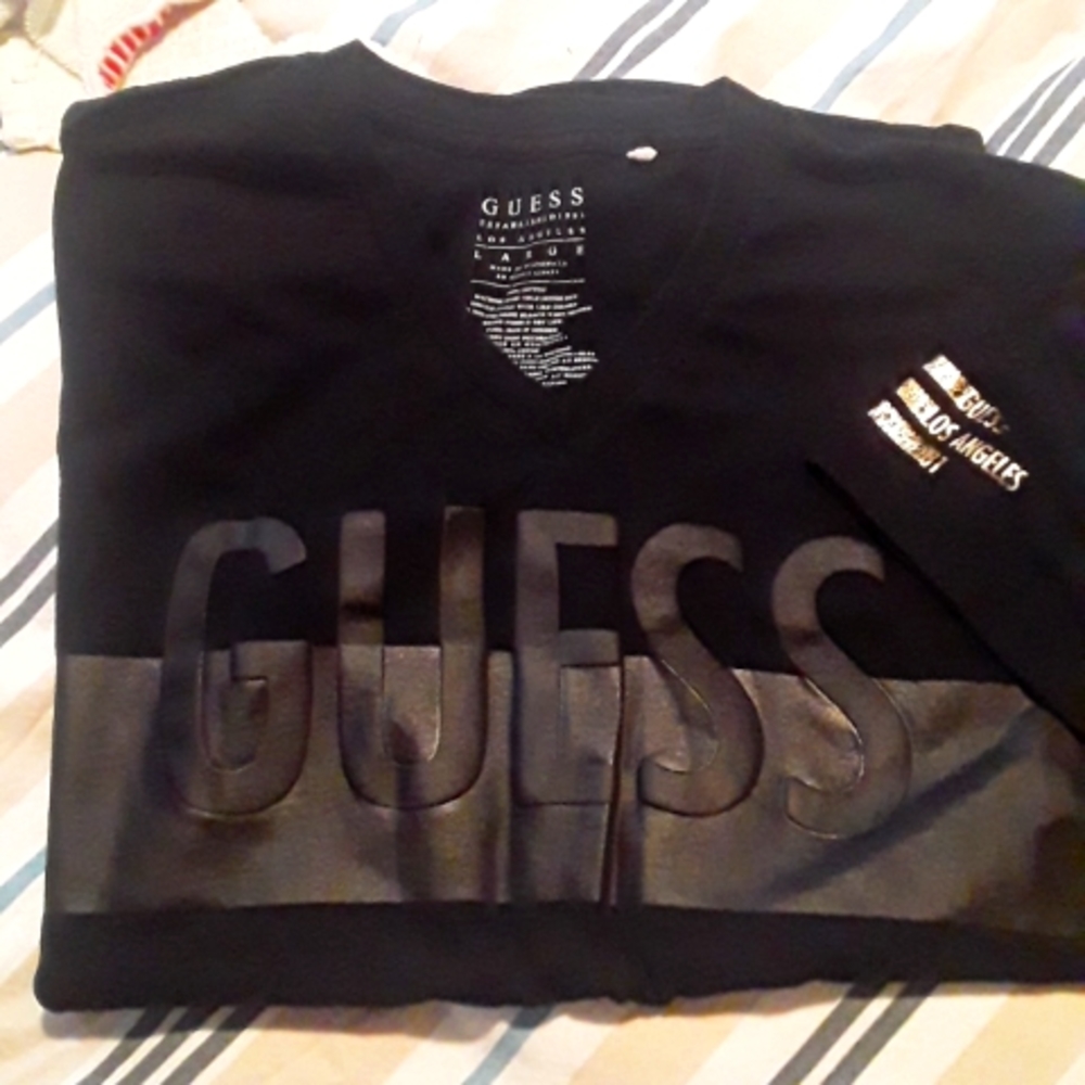 Guess V neck T shirt.